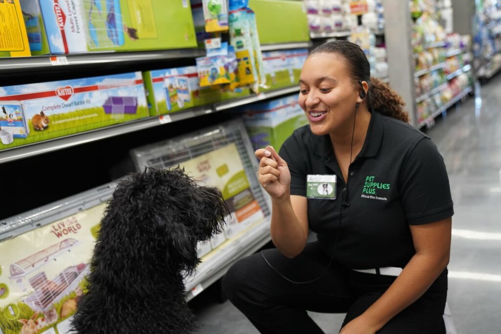 Pet Supplies Plus employee with dog