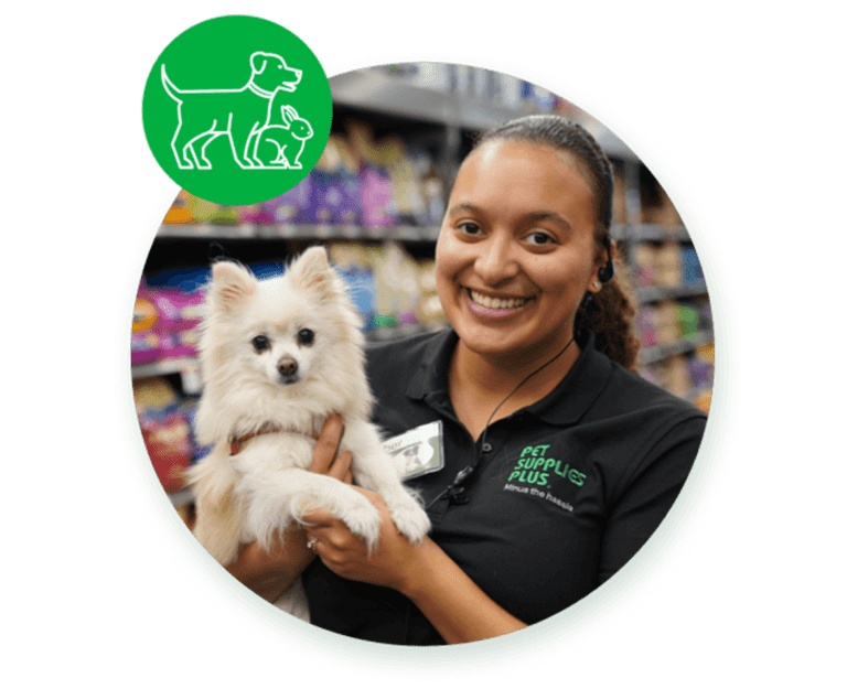 Pet Supplies Plus Employee with little white dog